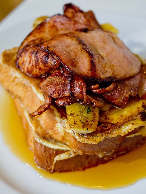 Brioche French toast with caramelized banana, Bacon and maple syrup